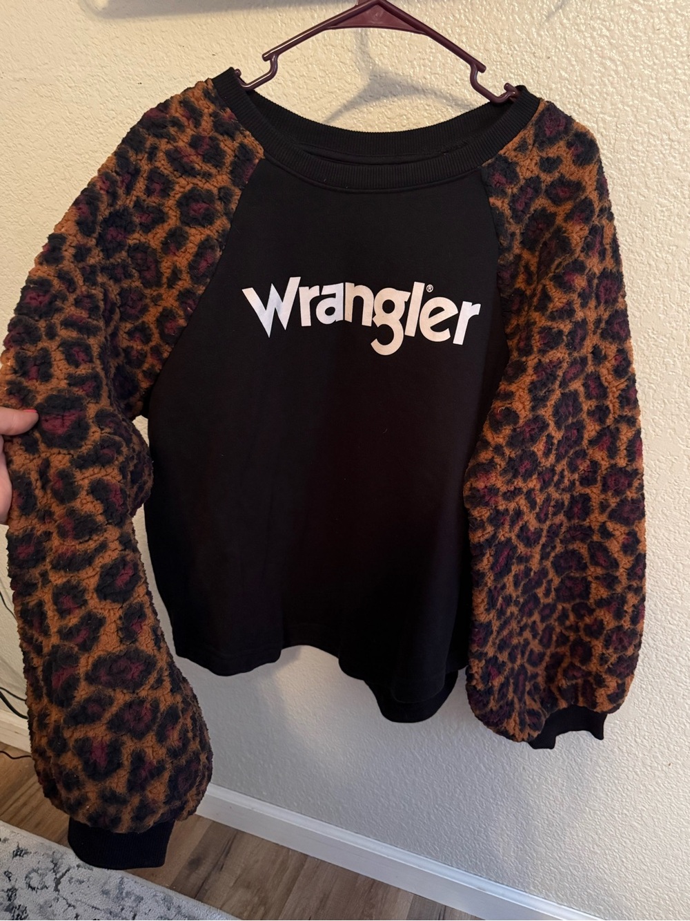 Wrangler Black Pullover with Leopard-Print Fuzzy Sleeves